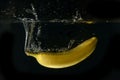 Banana falling into water