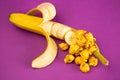 Banana Flavored Popcorn on a Purple Background Royalty Free Stock Photo