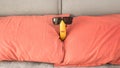 A funny banana in sunglasses lies on the bed in the hotel,close-up. Royalty Free Stock Photo