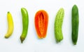 Banana, green long eggplant, ripe papaya, bitter melon, green papaya on white background