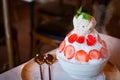 Banana ice cream with strawberry and mint in cup Royalty Free Stock Photo