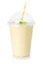 Banana juice smoothie fresh drink milkshake milk shake in a cup isolated on white