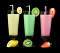 Banana, kiwi and strawberry milk shake and fresh fruis Royalty Free Stock Photo