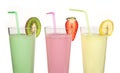 Banana, kiwi and strawberry milk shake and fresh fruis Royalty Free Stock Photo