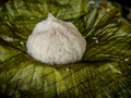 Banana leaf wrapped in rice