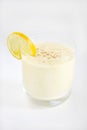 Banana, lemon and mango lassi, smoothie or frappe with cardamom