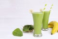 Banana mix spinach avocado apple smoothie green juice beverage healthy Royalty Free Stock Photo