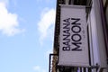 Banana moon logo facade and text sign brand front of shop of swimwear women store