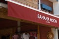 Banana moon logo sign and brand text on swimwear chain store facade clothing shop