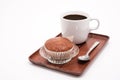 Banana muffin cake and coffee cup on wooden tray isolated on white background Royalty Free Stock Photo