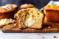 banana muffin cut in half, showing moist interior