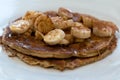 Banana and oat pancake with sliced bananas