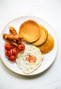 Banana Oat Pancakes with Fried egg,Sausages and Cherry Tomatoes Royalty Free Stock Photo