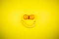 Banana and oranges in the form of a smile