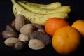 Banana, oranges and mixed nuts