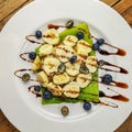 Banana Pancakes with Chocolate Syrup and Blueberries Royalty Free Stock Photo