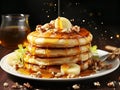 Banana pancakes oatmeal with slices of fresh bananas, walnuts and honey on top on white plate Royalty Free Stock Photo