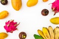 Banana, papaya, mango, mangostin and dragon fruits on white background. Flat lay. Top view