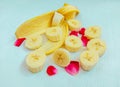 Banana pealed and sliced cut in pieces fresh bananas fruit nutritious edible musa kela closeup view image photo