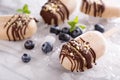 Banana and peanut butter popsicles with chocolate Royalty Free Stock Photo