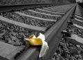 Banana peel on railway. Train Sabotage humoristic conceptual image