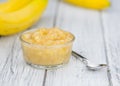 Banana Puree on wooden background Royalty Free Stock Photo