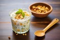 banana raita in a glass bowl with a honey drizzle Royalty Free Stock Photo