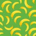 Banana seamless pattern on green background. Tropical fruits wallpaper. Royalty Free Stock Photo