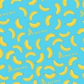 Banana seamless pattern. Yellow bananas on a blue background. Royalty Free Stock Photo