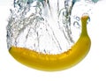 Banana splashing into water Royalty Free Stock Photo