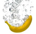 Banana splashing into water Royalty Free Stock Photo