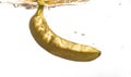 Banana splashing into water Royalty Free Stock Photo
