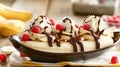 A banana split with chocolate sauce and raspberries