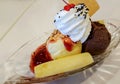 Banana split with ice cream and topping