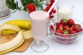 Banana and strawberry fruit smoothies, fruit on the table, in the plate Royalty Free Stock Photo