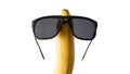 Banana in sunglasses isolated on white,close-up. Royalty Free Stock Photo