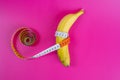 Banana tape measure on background