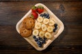 Banana toast with fruits and cookies