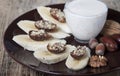 Bananas with dates , nuts . Royalty Free Stock Photo