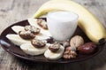 Bananas with dates . Royalty Free Stock Photo