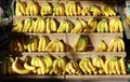 Bananas on a display shelf in a fruit and vegetable store