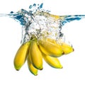 Bananas falling in water Royalty Free Stock Photo