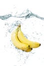 Bananas falling in water Royalty Free Stock Photo