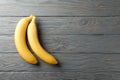 Bananas on gray wooden background Royalty Free Stock Photo