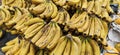 Bananas for sale in a supermarket gondola Royalty Free Stock Photo