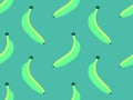 Bananas seamless pattern. Green bananas in flat style. Design for printing on fabric, banners and wrapping paper. Vector
