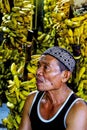 A bananas seller at traditional market.