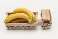 Bananas in trailer truck, toy made of wood. Royalty Free Stock Photo