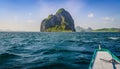 Banca Boat approaching Inabuyatan Island on Windy Day, El, Nido, Palawan, Philippines Royalty Free Stock Photo