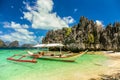 Banca boat at a beautiful beach in Miniloc Island,Philippines Royalty Free Stock Photo